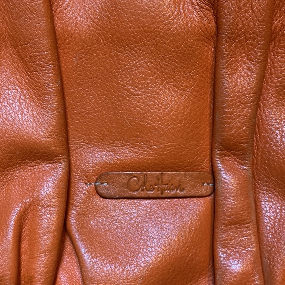 Cole Hahn orange handbag with fringe and silver hardware. - Picture 11 of 16